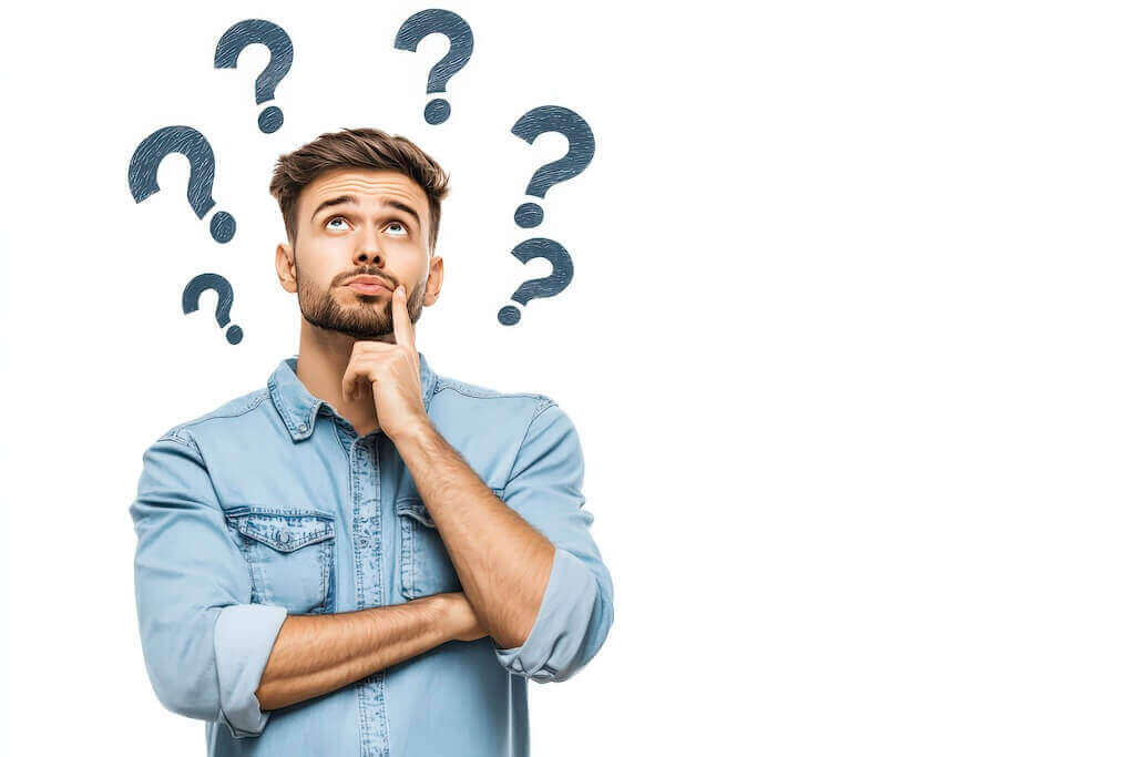 Как выбрать подходящую систему для проведения вебинаров? Мужчина в раздумьях, выбирает систему для вебинаров, над головой знаки вопроса